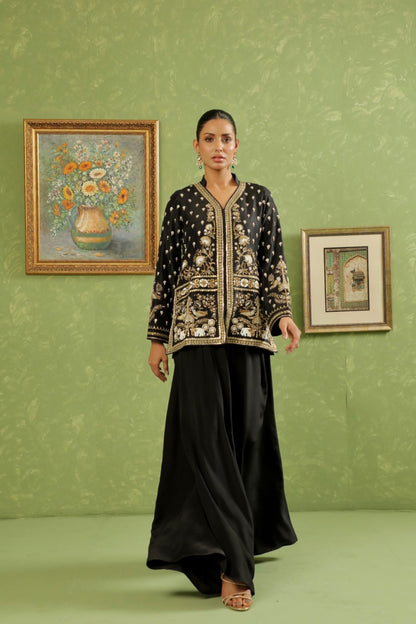 Black Jacket with Flowy Pants showing Movement 
